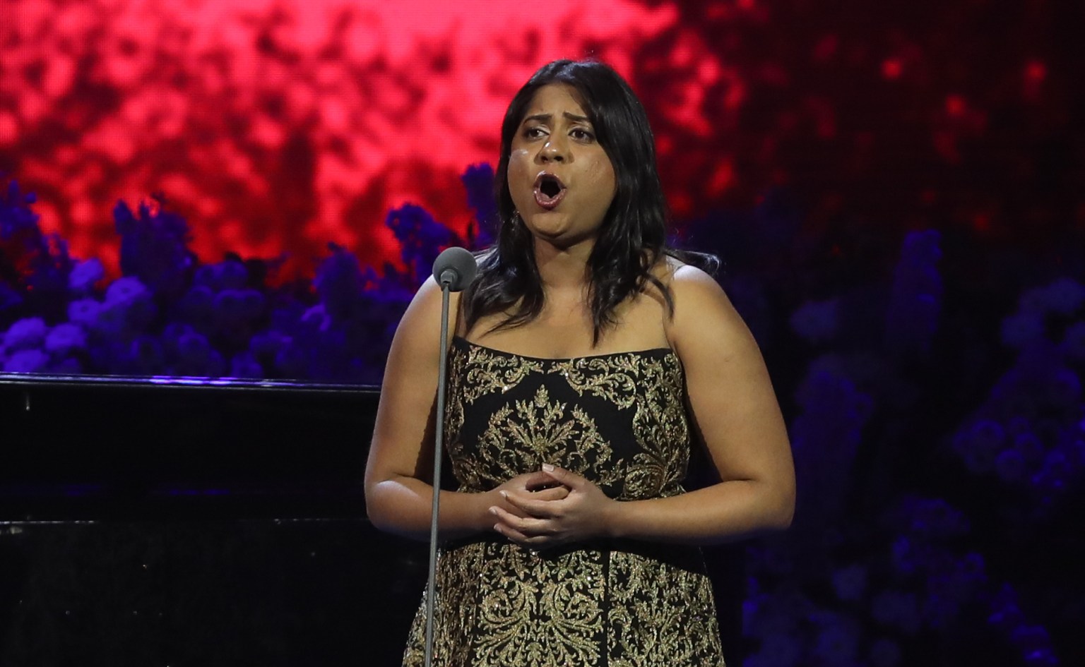 Soprano Shimona Rose singing on stage during the Pendine International Voice of the Future competition at the 2024 Llangollen International Musical Eisteddfod.