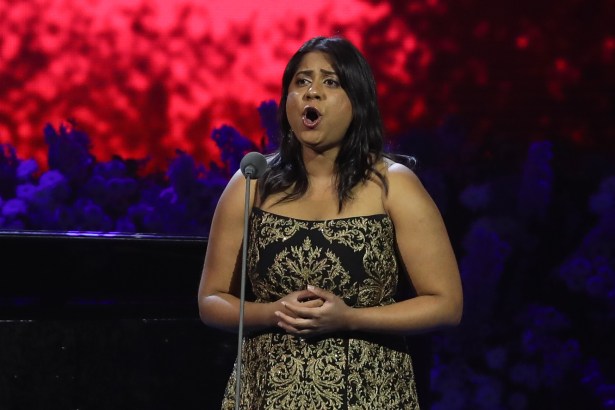 Soprano Shimona Rose singing on stage during the Pendine International Voice of the Future competition at the 2024 Llangollen International Musical Eisteddfod.