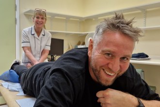 Ryan Jones completing a physiotherapy exercise following ankle surgery.