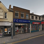 Street‑level image of the Cancer Research UK shop on Union Street, showing the storefront and surrounding pavement.