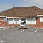 Street‑view image showing the front entrance of Meddygfa’r Sarn GP surgery in Pontyates.