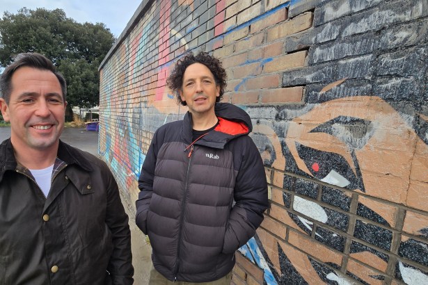 Cllr Andrew Stevens and Jeremy Donaldson standing on site at Victoria Park during the start of construction on the new skate plaza.