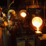 Workers at Wall Colmonoy’s Pontardawe facility pouring molten metal during the alloy casting process.