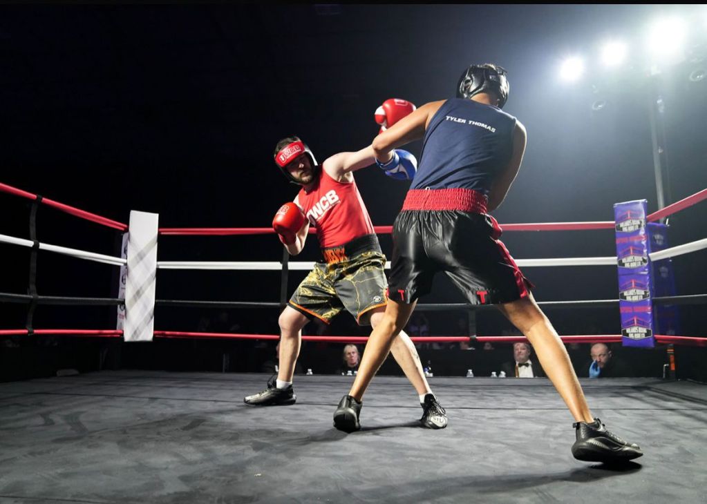 Anthony Trubridge boxing in the ring during his Ultra White Collar Boxing match in Cardiff.
