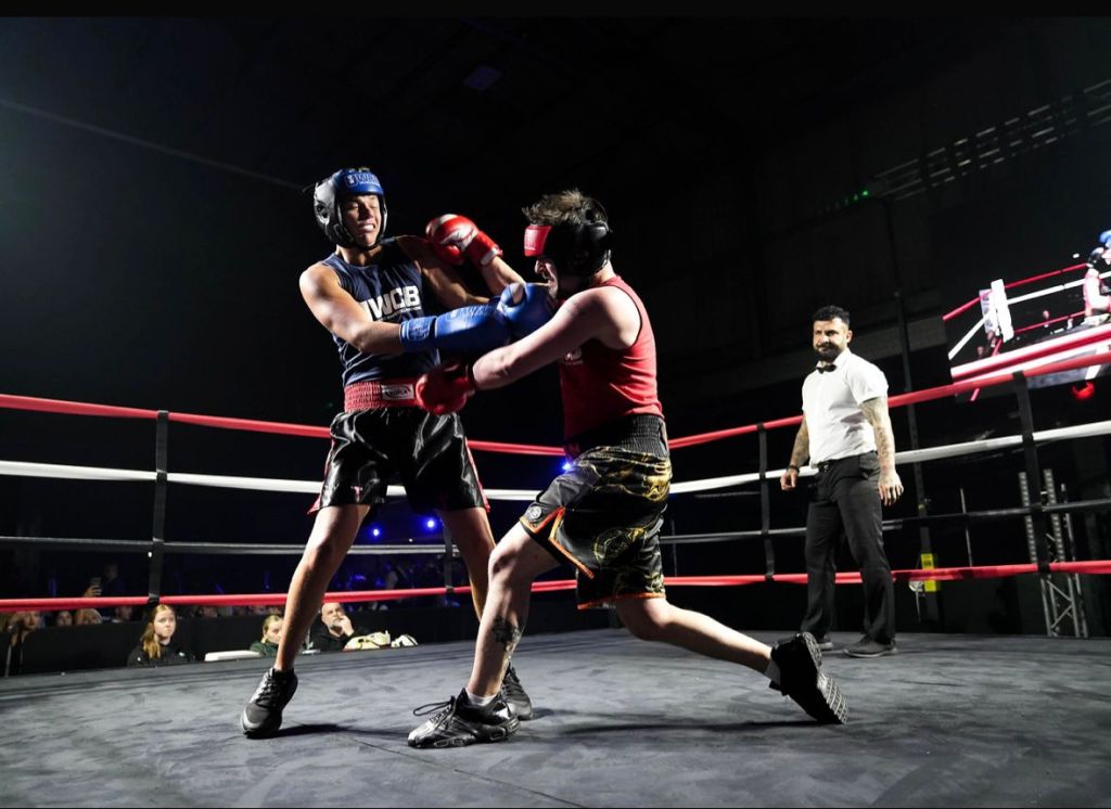 Close‑up of Anthony Trubridge boxing in the ring during his Ultra White Collar Boxing bout in Cardiff.
