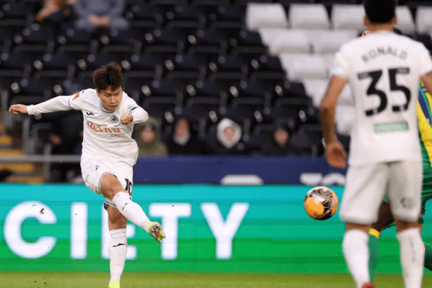 Ji-Sung Eom opening the scoring for Swansea City against West Bromwich Albion in the FA Cup third round tie at the Swansea.com stadium.