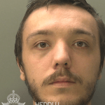 Police custody photo of Jack Barrett, a 25‑year‑old man from Waunarlwydd jailed for online child sex offences.