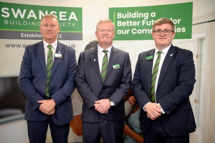 Three senior Swansea Building Society staff — Tony Rees, Alun Williams and David Osterland — standing together for a branch team photograph.