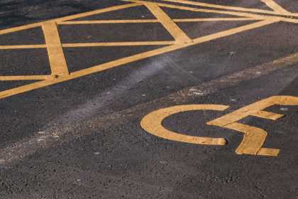 Disabled parking bay with clear road markings.
