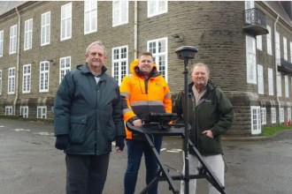 Survey team using specialist equipment outside County Hall in Carmarthen while investigating whether executed prisoners from the former jail remain buried on the site.