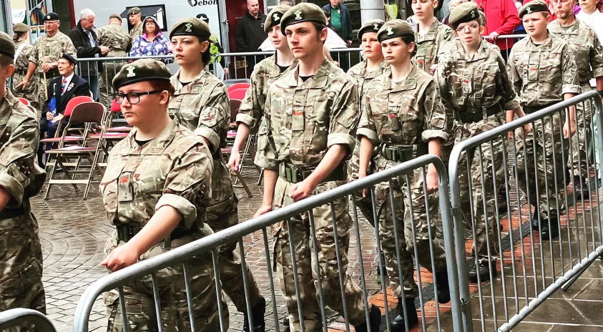 Cadets in uniform marching in an Armed Forces Day parade in Llanelli in 2023.