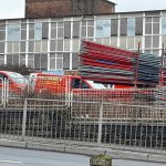 Prichard’s contractors and equipment on the fenced demolition site at the former Daniel James Community School.