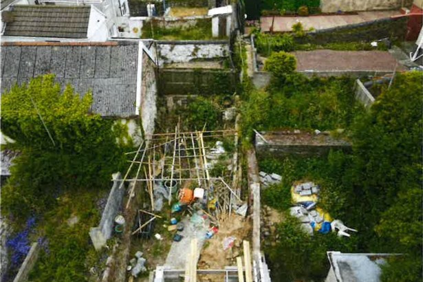 Aerial view of an unsafe, partially built construction site associated with rogue builder Lee Slocombe’s fraudulent work.