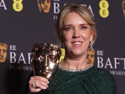 Lauren Evans from Hendy holding her BAFTA award for Best Casting at the 2026 BAFTA Film Awards ceremony