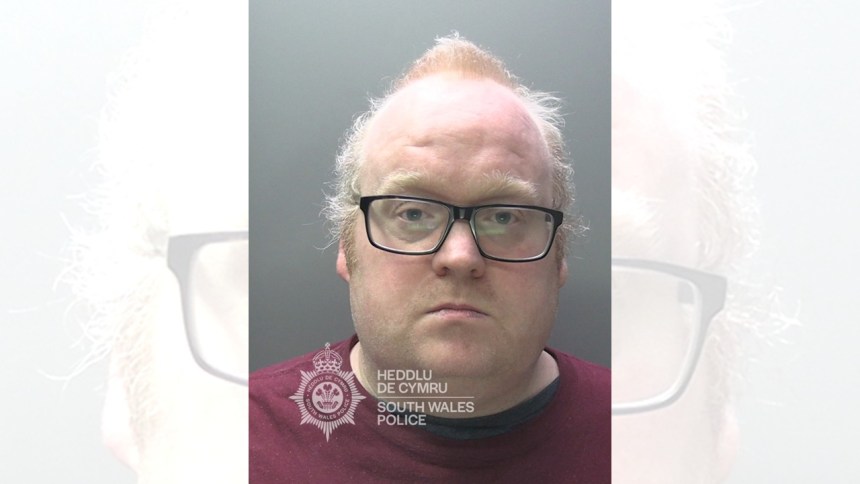 Police custody photograph of Adrian Fine, jailed for attempting to engage in sexual communication with children.