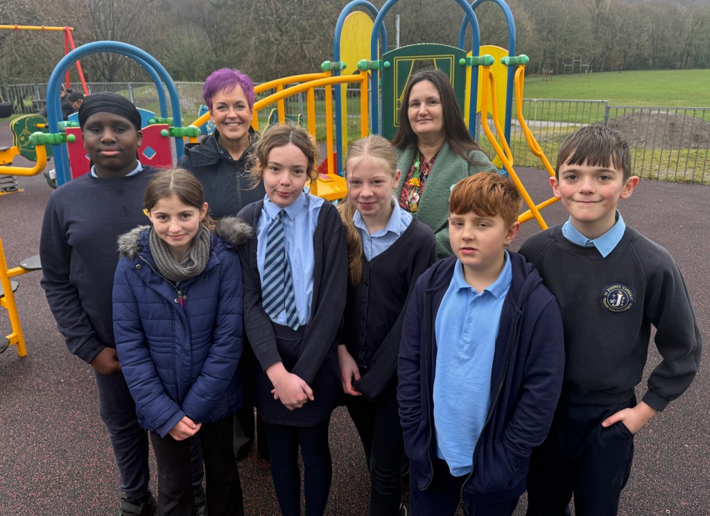 Dawn Bowden Welsh Government Minister and Cllr Hayley Gwilliam with schoolchildren at Coed Gwilym Park Clydach play area Swansea
