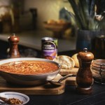 A steaming bowl of minestrone soup