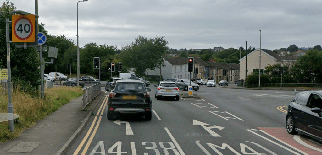 Image showing traffic at the A4138 Halfway junction in Llanelli, with visible signage for the M4 and speed enforcement infrastructure.