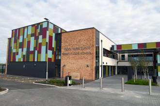 Exterior of Ysgol Harri Tudur in Pembroke, a modern secondary school building now placed in special measures.