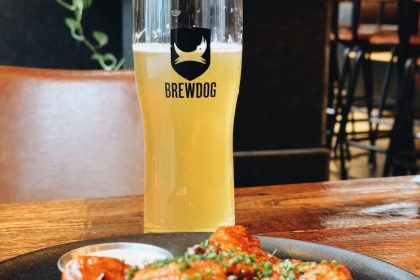 glass of brewdog beer with chicken legs