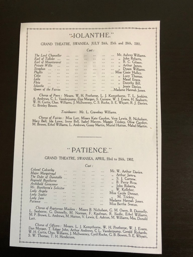 Vintage printed programme pages listing cast members for SAOS productions of Iolanthe (1901) and Patience (1902) at the Grand Theatre, Swansea.