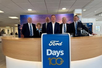 Staff and representatives gather to celebrate the 100th anniversary of Day’s Motor Group in Swansea