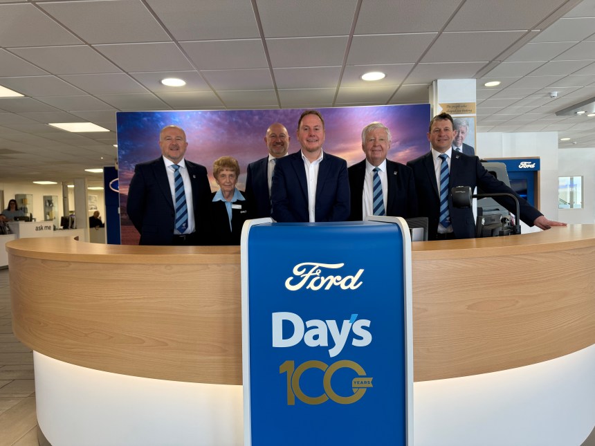 Staff and representatives gather to celebrate the 100th anniversary of Day’s Motor Group in Swansea