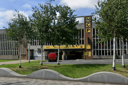 Exterior view of NCP Swansea Kingsway multi-storey car park on The Kingsway with entrance and signage visible.