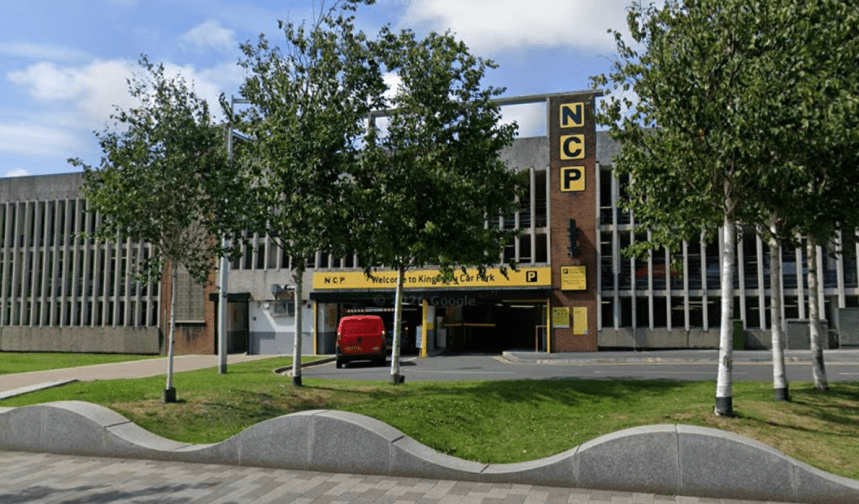 Exterior view of NCP Swansea Kingsway multi-storey car park on The Kingsway with entrance and signage visible.