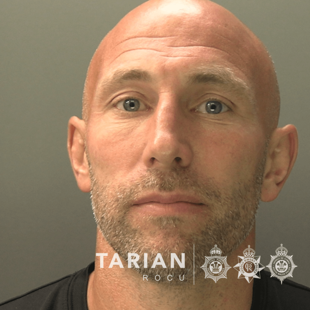 Custody photo of gang leader, Danny Tomlin