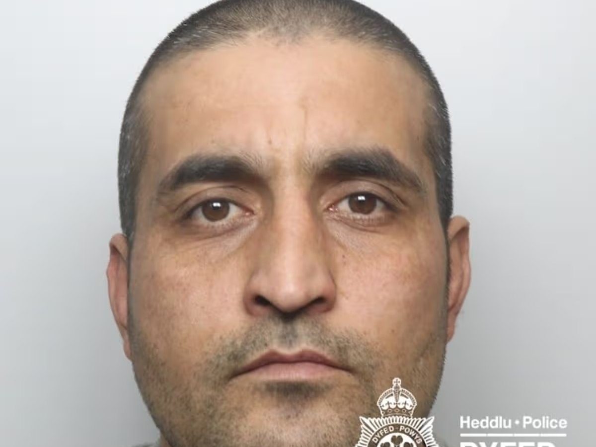 Custody image of Talha Ahmadzai released by Dyfed-Powys Police following his sentencing at Swansea Crown Court for multiple serious sexual offences