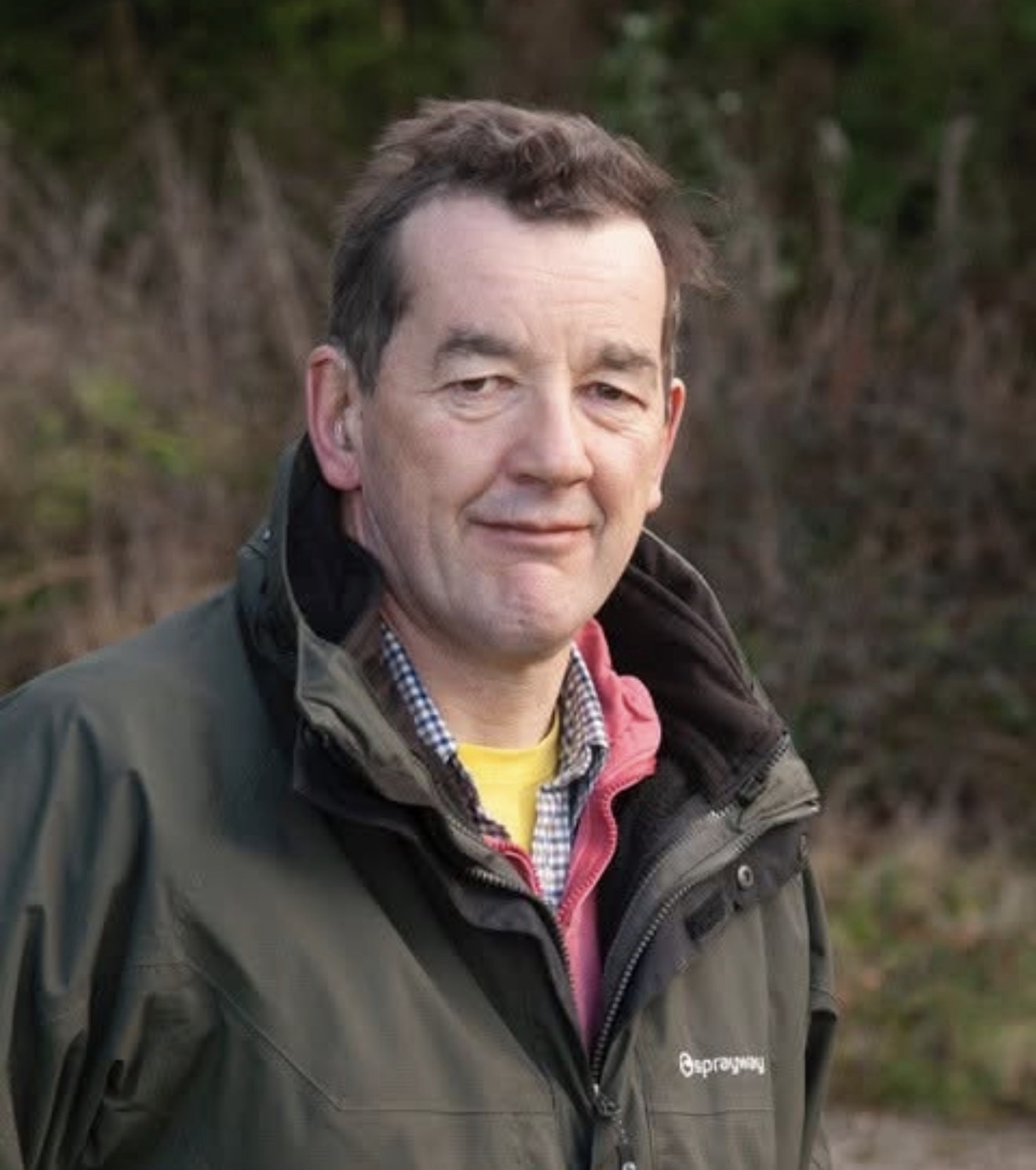 A headshot of Patrick Benham-Crosswell