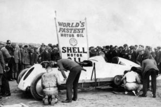 The historic land speed record car Babs on Pendine Sands, marking the centenary of its 1926 world record run.