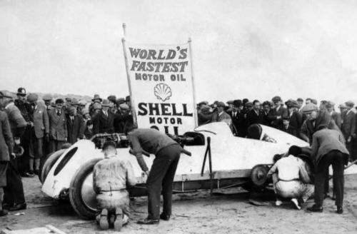 The historic land speed record car Babs on Pendine Sands, marking the centenary of its 1926 world record run.