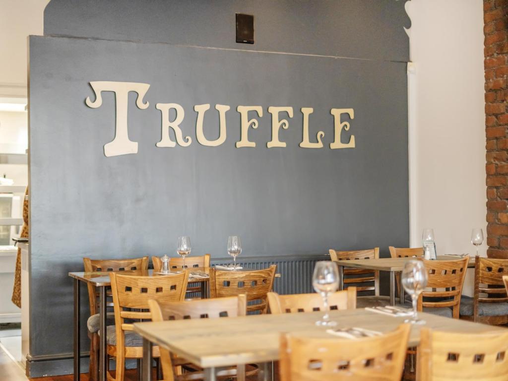 The Truffle lettering on the wall inside the restaurant on King Edwards Road in Uplands, Swansea