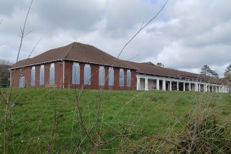 Metal shutters cover the windows at Gorseinon Hospital