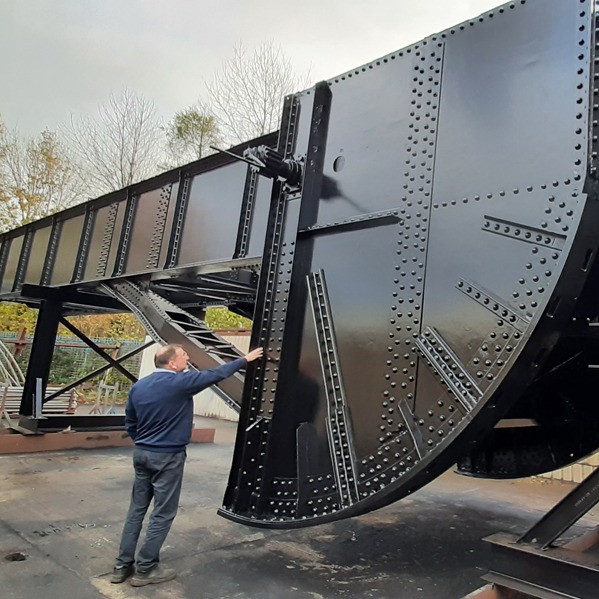 Swansea's restored Bascule Bridge which is on the move ready to be lifted back into its permanent position over the River Tawe. (Image: Swansea Council)