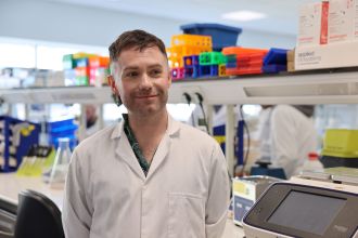 Ben Williams in the laboratory at Swansea University's Medical School.