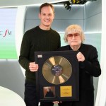 Classic FM presenter Dan Walker presents legendary Welsh composer Sir Karl Jenkins with an award for The Armed Man: A Mass for Peace being named number one in the Classic FM Hall of Fame.