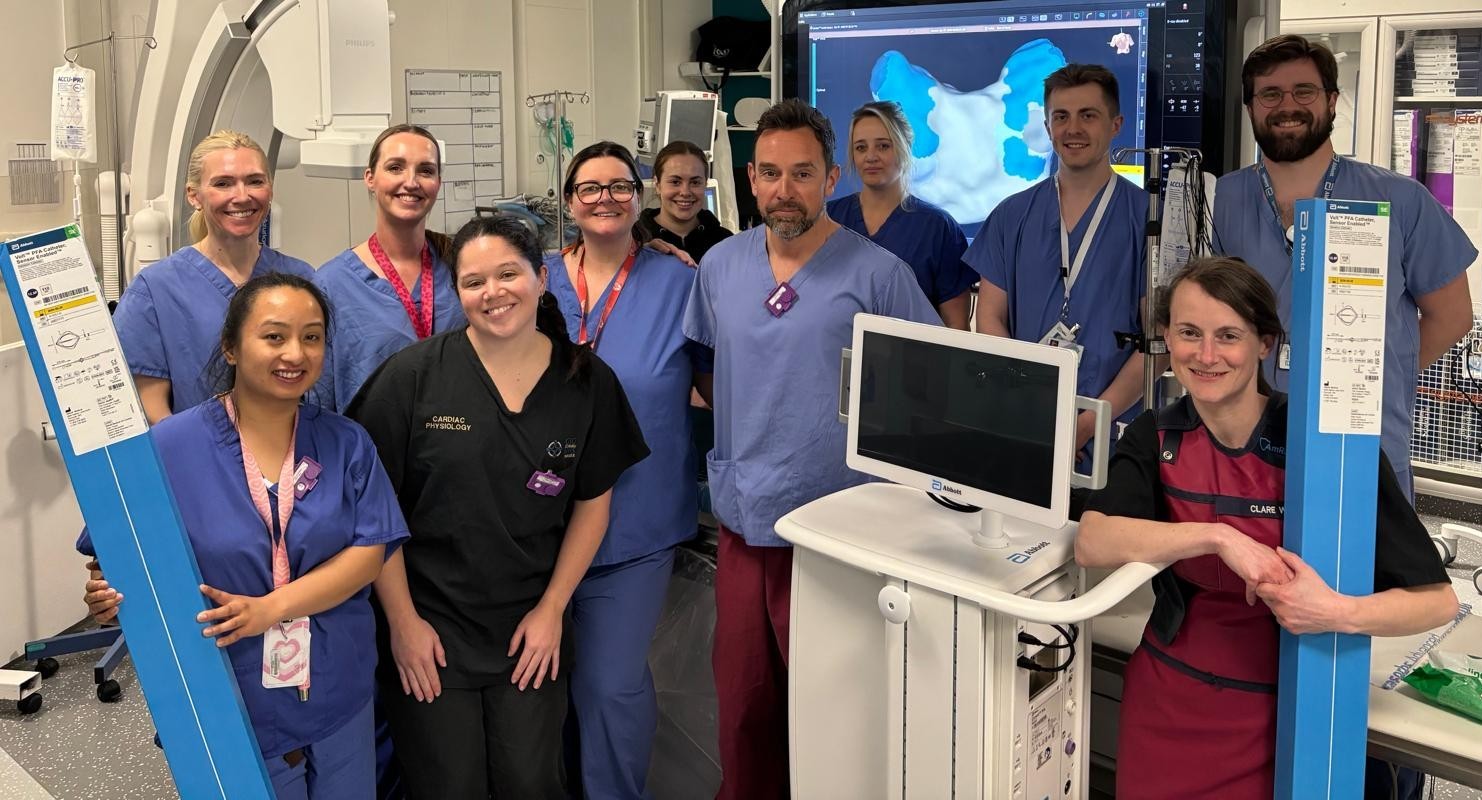 The Morriston Hospital cardiology team with the Volt PFA system. From left: Monica Angeles, Melissa Madden, Lizzie Murphy, Eve Burns-Thomas, Anne-Marie Davies, Tamsin de Bude, Dr Dewi Thomas, Emily Church, Sam Peddie, Harry Mahoney and Claire Warren. Image: Swansea Bay University Health Board