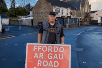 Cllr Dai Jenkins at Sterry Road in Gowerton which has been closed following the major fire at the former LNW Club