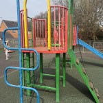 Ageing climbing frame with slide at Coed Hirwaun play park, Port Talbot