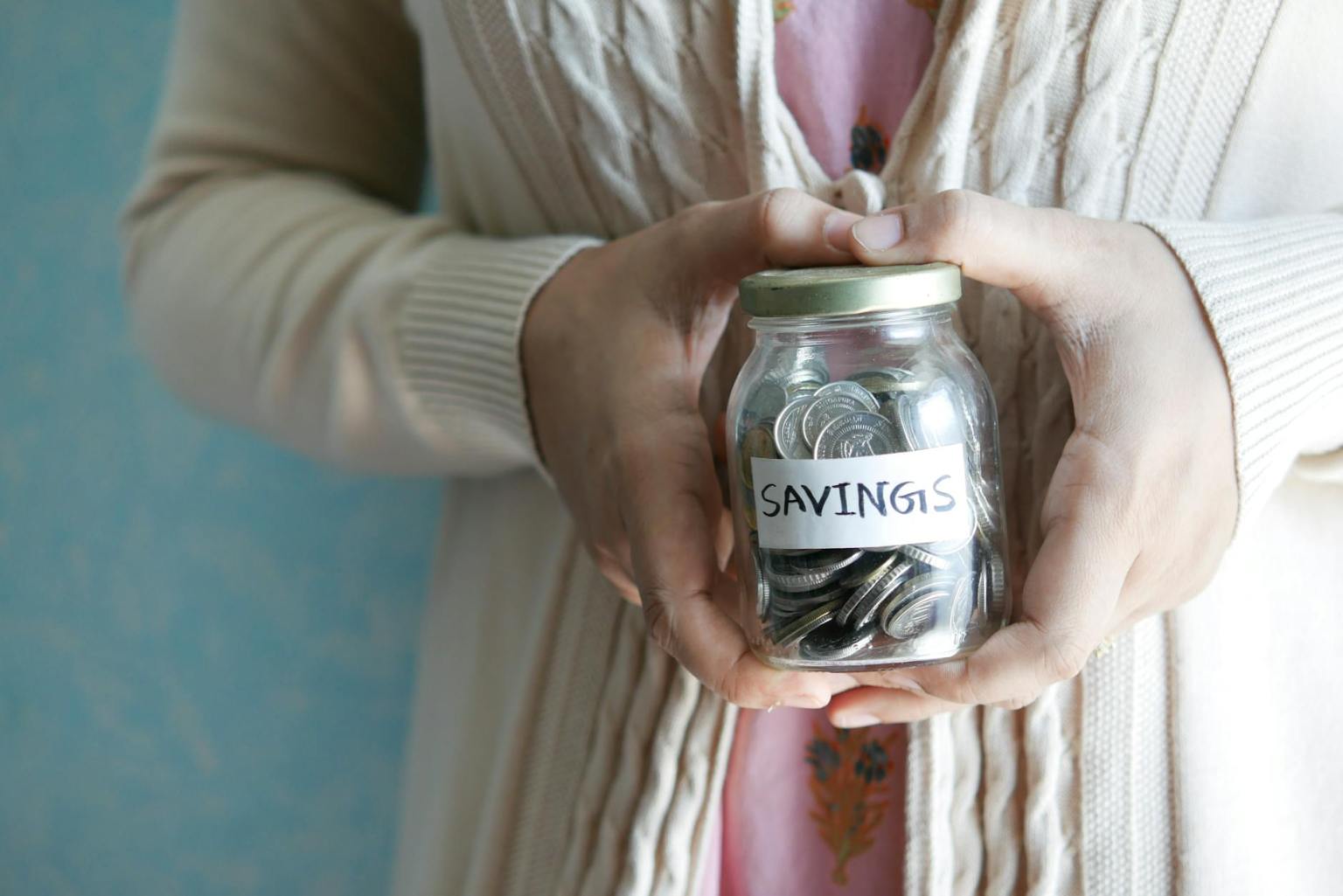 person holding a jar