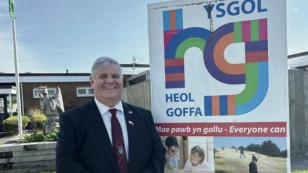 Llanelli Councillor Andrew Bragoli outside Ysgol Heol Goffa