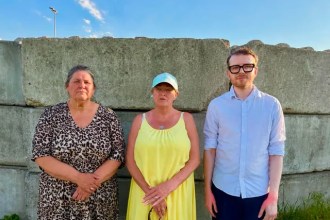 Cllr Josh Tuck with local residents Carol Clement-Williams and Suzanne Paddison at the closed section of the Wales coastal path