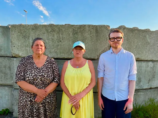 Cllr Josh Tuck with local residents Carol Clement-Williams and Suzanne Paddison at the closed section of the Wales coastal path