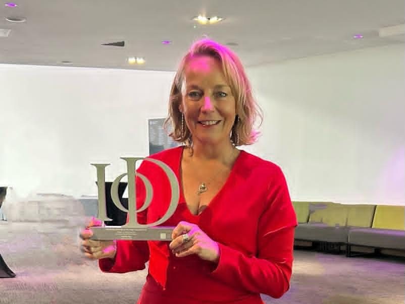 Cherrie Bija with her IoD Wales Director of the Year award. Picture: Faith in Families