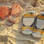 colorful sandals on rio de janeiro beach sand