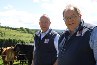 Farmers' Union of Wales (check the l-r against the actual photo). Alt: Ian Rickman and Dai Miles standing together after their re-election as the Farmers' Union of Wales presidential team.