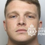 Police custody photograph of Brooklyn Thomas